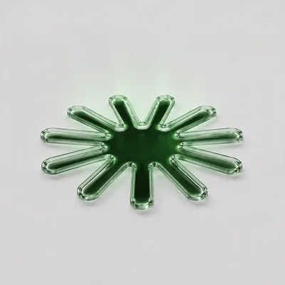 Green light rising out of a hole in the floor